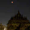 A Super Blood Moon rises over the Plaosan temple in Indonesia