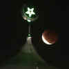 A full moon rises over a mosque as a total lunar eclipse was taking place in Jakarta, Indonesia (AP photo)