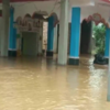 Odisha: Baitarani River continues to flow above the danger level, flooding nearby residential areas. Visuals from earlier today in Bhadrak. (ANI)