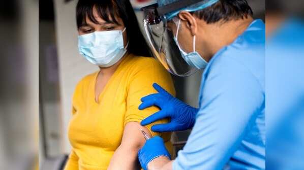 Is it normal for your blood pressure to rise post-vaccination?