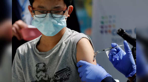 Which companies are working on developing a COVID-19 vaccine for kids? Have clinical trials started?