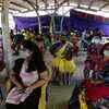 People wait to get Covid-19 vaccination at Kasimedu fishing harbour in Chennai on Thursday