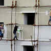 Article image for: A group of painters busy painting to a <i class="tbold">new apartment</i>
