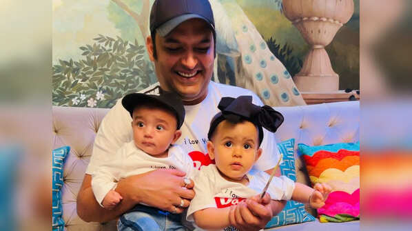 Kapil with his two babies for the first time