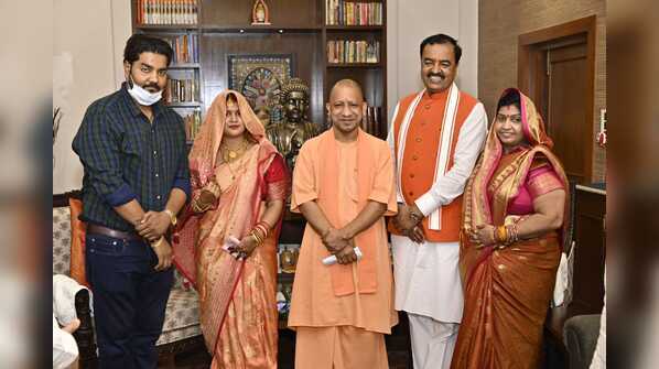 Photos: All’s well? Keshav Prasad Maurya’s lunch for Yogi Adityanath
