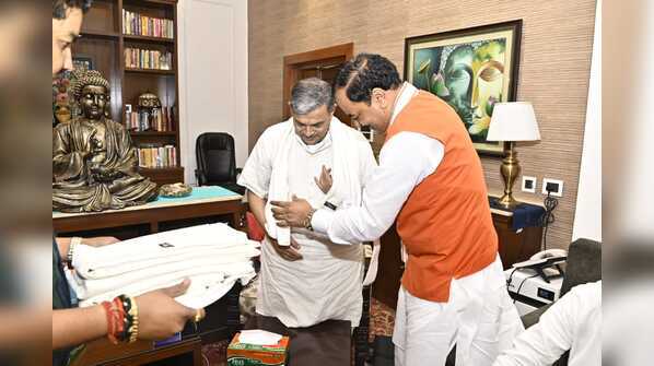Photos: All’s well? Keshav Prasad Maurya’s lunch for Yogi Adityanath