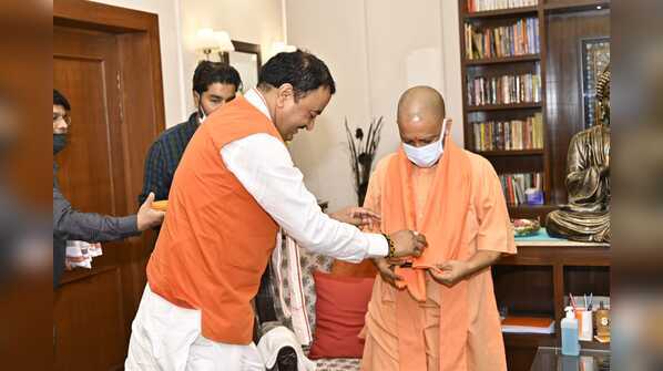 Photos: All’s well? Keshav Prasad Maurya’s lunch for Yogi Adityanath