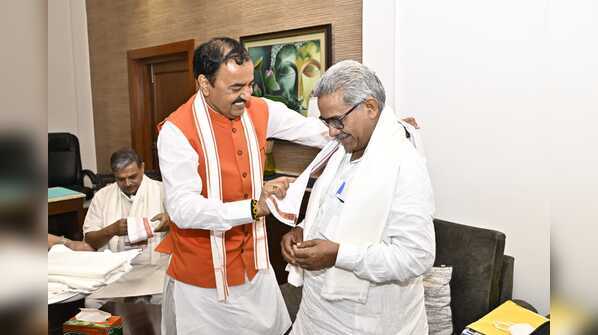 Photos: All’s well? Keshav Prasad Maurya’s lunch for Yogi Adityanath