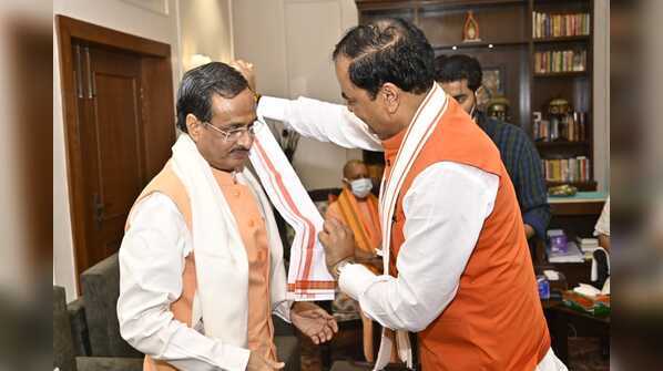 Photos: All’s well? Keshav Prasad Maurya’s lunch for Yogi Adityanath