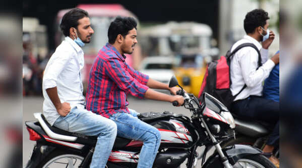 Photos: Masks slip as India ignores Covid norms