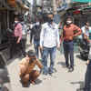 Article image for: Photos: <i class="tbold">masks</i> slip as India ignores Covid norms