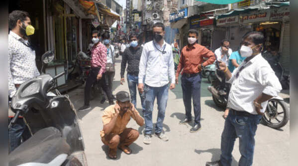Photos: Masks slip as India ignores Covid norms