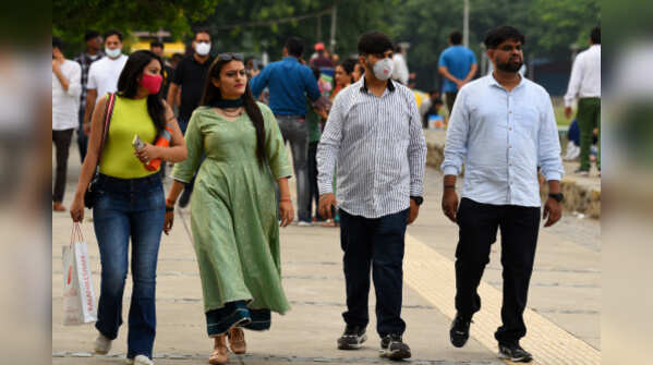 Photos: Masks slip as India ignores Covid norms