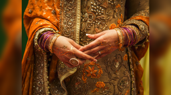 Wearing bridal attires