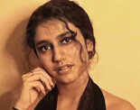 &lsquo;Wink Girl&rsquo; Priya Prakash Varrier stuns internet in a black dress with a plunging neckline for a photoshoot