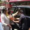 BJP leader Jyotiraditya Scindia leaves from his residence as his supporters gather outside