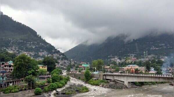 River and drain are in spate in Kullu