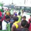 Farmers gather to board the buses at Singhu (Delhi-Haryana) border.