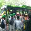 Delhi: Farmers board a DTC bus near Majnu ka Tila after one of their buses, which they boarded at the Singhu (Delhi-Haryana) border, broke down. (ANI)