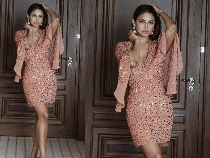 ​Pic: Rubina Bajwa’s coral dress is a wardrobe staple