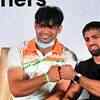 Neeraj greets Ravi with a fist bump