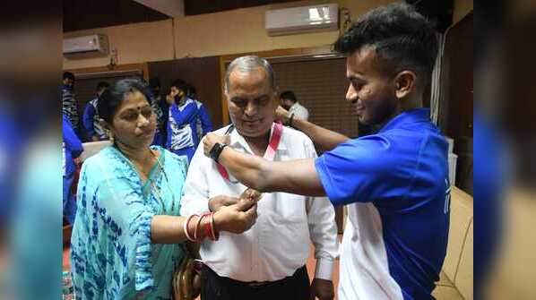 Photos: Yashodhara Raje in tears as she touches hockey star Vivek Sagar’s Olympic medal