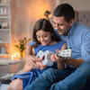 ​Parents play peaceful games with girls