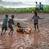 Playing football in the rain