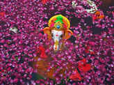 Ganeshotsav 2021: Devotees immerse idols of Lord Ganesha in water