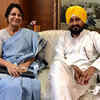 Punjab chief secretary Vini Mahajan greets CM-designate Charanjit Singh Channi at his residence.