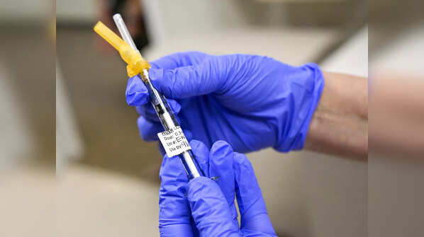Can booster shots be given with flu vaccines?