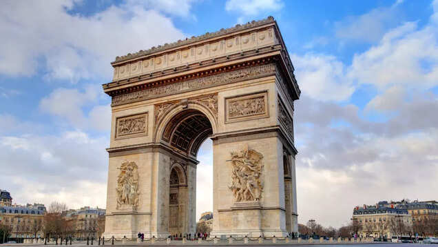 Wrapped in silver: Paris' Arc De Triomphe is now wrapped in 270,000 sq ft of fabric