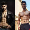 Flaunting his abs