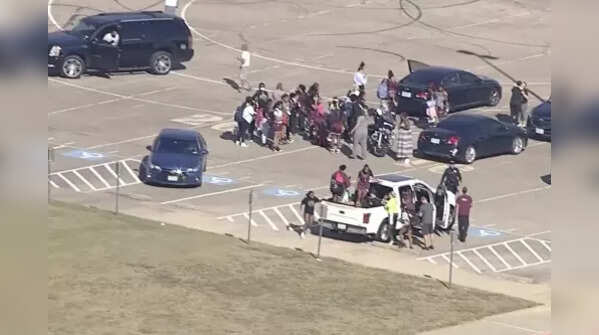 Another video grab of law enforcement officers arriving at the Timberview High School in Dallas area.