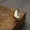 ​Heavy gold rings studded with Polki