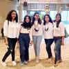 In colour-coordinated outfits
