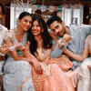 Erica and Shaheer strike a pose with reel family