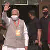 PM waves at the crowd.