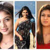 ​Slick pulled back bangs and embellished saree