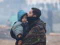 These pictures of migrants braving cold at Poland-Belarus border will melt your heart