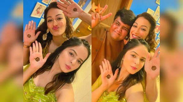 Flaunting their mehendi design