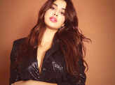 These jaw-dropping pictures from Janhvi Kapoor’s new photoshoot in a shimmery black pant-suit with plunging neckline will make you go wow