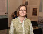Socialites attend an exhibition