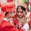 Their bright red wedding look
