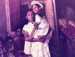 Holding her brother Vijay