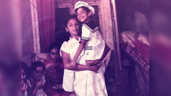 Holding her brother Vijay