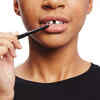 How to flaunt a faux tooth gap