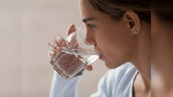 What happens when you drink water standing