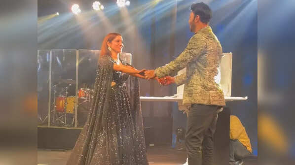 Hand-in-hand on stage