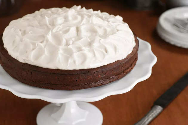 flourless-chocolate-cake-with-whipped-meringue-topping-picture-id139488356